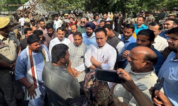 BJP leaders meeting with shelling-affected people in Uri on Friday.