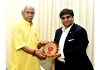 Chairman Indian Chamber of Commerce, Jammu, Rahul Sahai presenting an idol of Hanuman Ji to LG, Manoj Sinha.