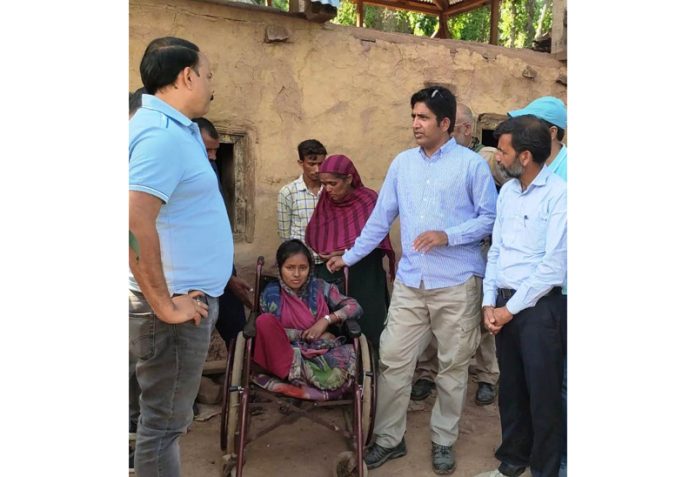 DC Ramban meeting specially-abled girl in remote Kriya village.