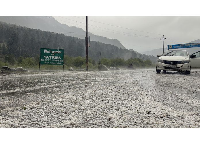 A view of hailstorm and gale in Kashmir. -Excelsior/Sajad Dar