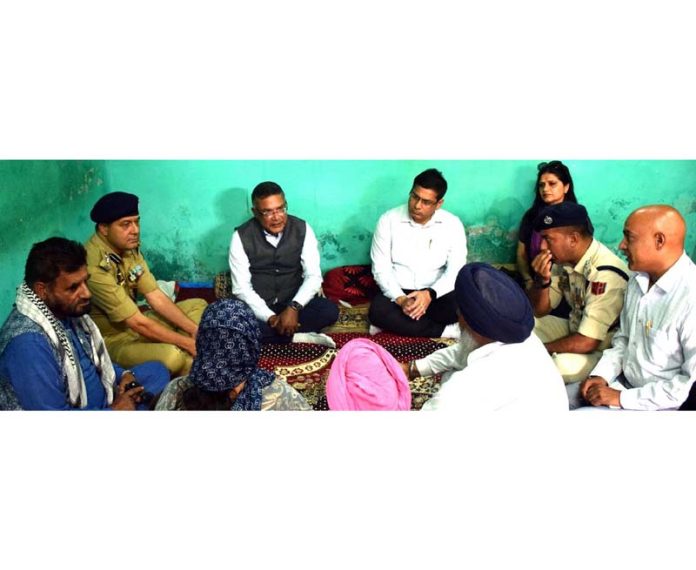 Principal Secretary Shailendra Kumar meeting with shelling affected family at Poonch on Friday. Principal Secretary Shailendra Kumar meeting with shelling affected family at Poonch on Friday.