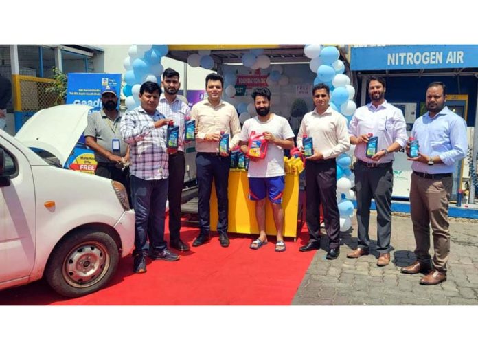 BPCL dignitaries launching vehicle care initiative, 'Gaadi Ko Thanda Pilaya Kya' at KN Filling Station in Jammu on Friday.