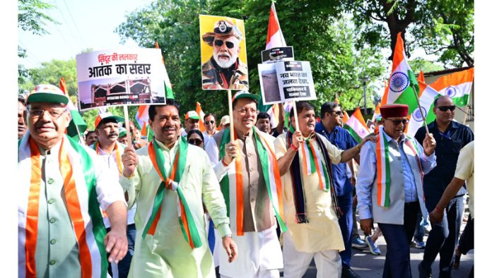 CM Pushkar Singh Dhami leading Tiranga Shaurya Samman Yatra in Uttarakhand. CM Pushkar Singh Dhami leading Tiranga Shaurya Samman Yatra in Uttarakhand.