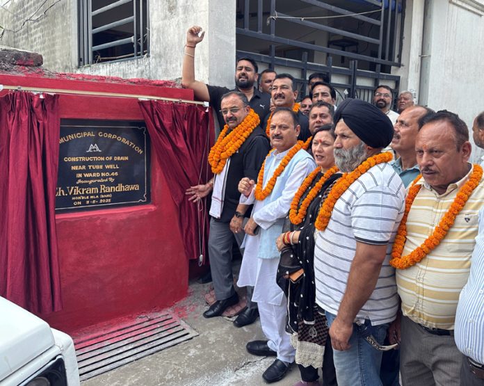 MLA Bahu Ch Vikram Randhawa kick starting the up-gradation of drainage work at Sanjay Nagar. MLA Bahu Ch Vikram Randhawa kick starting the up-gradation of drainage work at Sanjay Nagar.