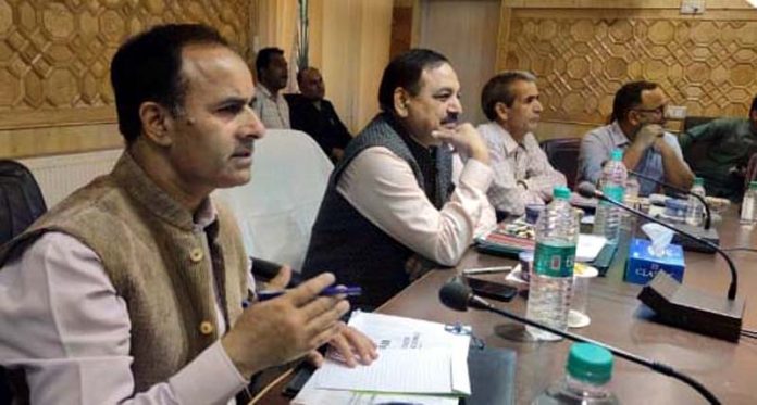 Secretary School Education, Ram Nivas Sharma chairing a meeting at Srinagar on Friday.