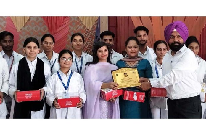 MLA Neena Mittal posing along with others during a medical camp organized by Aryans Institute of Nursing on Sunday.