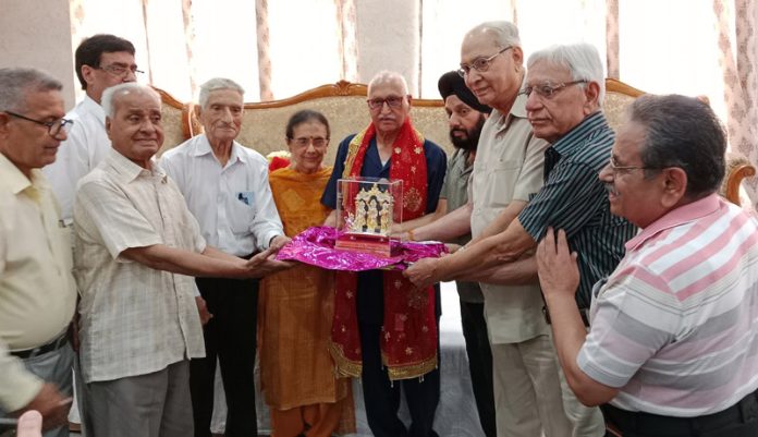 Vijay Kumar Bhagotra being presented with a religious souvenir for his dedicated services to the Vridh Ashram in Jammu on Thursday. Vijay Kumar Bhagotra being presented with a religious souvenir for his dedicated services to the Vridh Ashram in Jammu on Thursday.