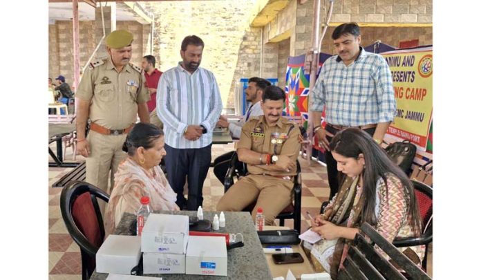 An elderly patient being screened during a medical camp at Bahu Fort. An elderly patient being screened during a medical camp at Bahu Fort.