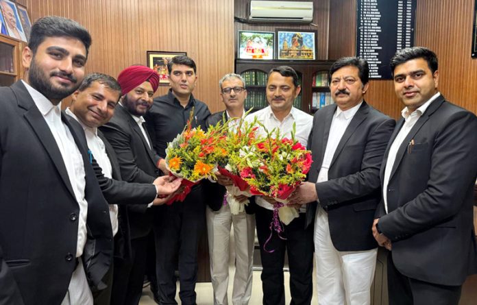 Bar Association president and others felicitating members elected to J&K Legislative Assembly.