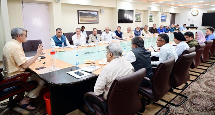 Chief Minister Omar Abdullah chairing a meeting on Monday.