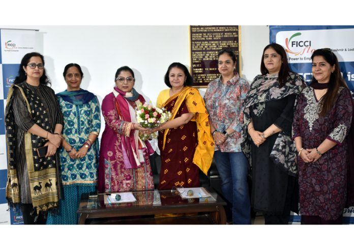 FICCI FLO JKL Chairperson Aarti Choudhary and Principal GCW Udhampur Prof Nalini Pathania during signing of an MoU.