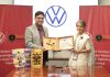 An official of Volkswagen receiving an award on Thursday.