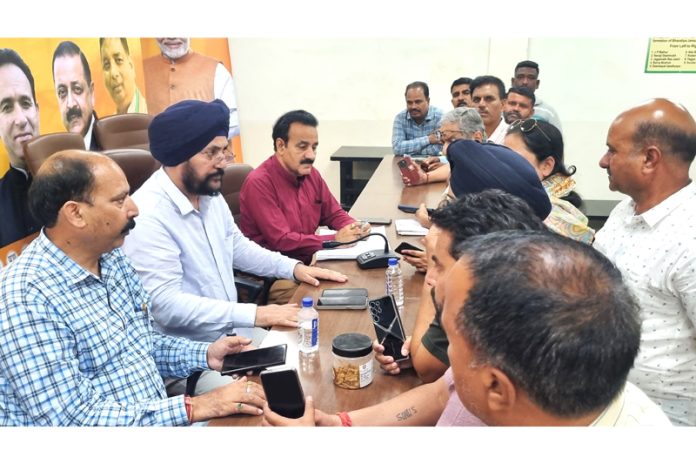 Dr Narinder Singh and Dr Rajeev Bhagat meeting with delegations during Public Darbar at BJP Hqrs on Tuesday.