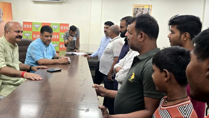 BJP leaders at a public darbar at party headquarters, Trikuta Nagar on Friday.