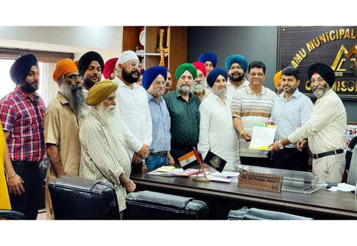 Residents of Ward 58 submitting memorandum to JMC Commissioner.