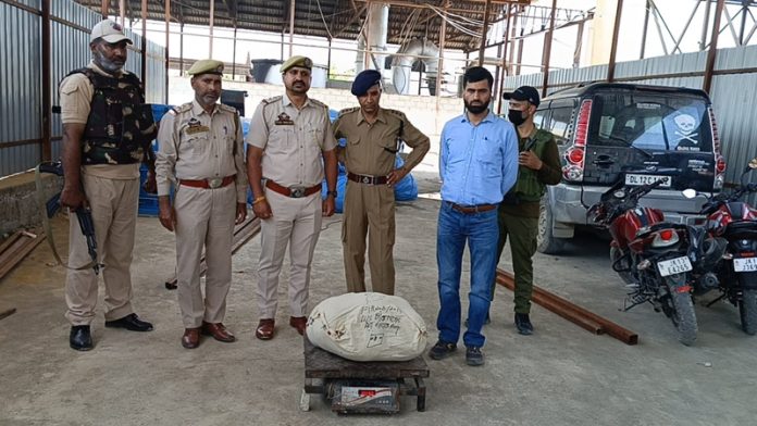 Railways police destroying seized narcotics.