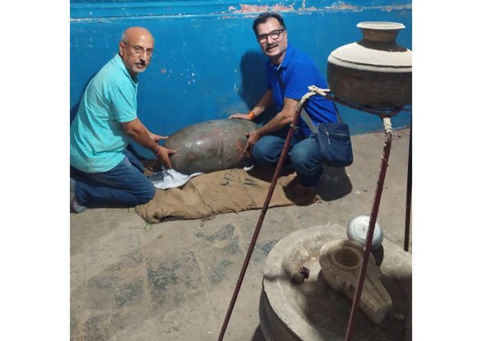 Rainawari Kashmiri Pandit Action Committee members taking possession of Shivalingam from Rainawari Police Station.