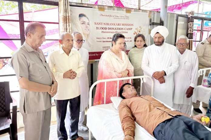 A volunteer donating blood during a camp organised by Sant Nirankari Mission in Mandli-Billawar. A volunteer donating blood during a camp organised by Sant Nirankari Mission in Mandli-Billawar.