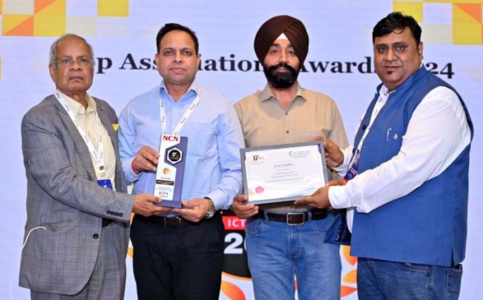 Dr Gopal Parthasarthi Sharma and Gurpreet Singh receiving an award on Sunday. Dr Gopal Parthasarthi Sharma and Gurpreet Singh receiving an award on Sunday.
