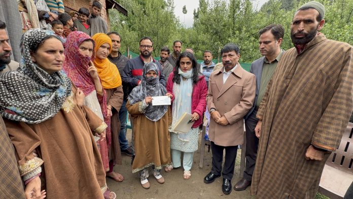 Assam Minister Meets Pahalgam Attack Victim In Kashmir, Offers Rs 5 Lakh Cheque Assam Minister Meets Pahalgam Attack Victim In Kashmir, Offers Rs 5 Lakh Cheque