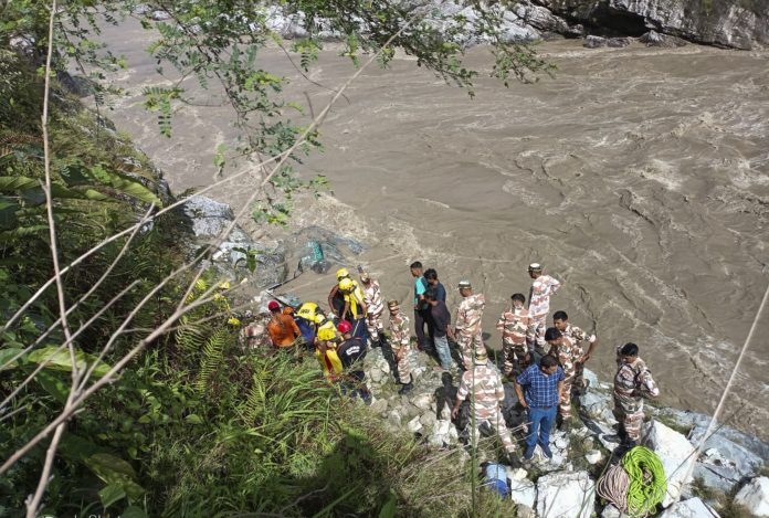 Tempo traveller falls in Alaknanda river Rescue operation underway after a tempo traveller carrying pilgrims fell into the Alaknanda River, in Rudraprayag district, Uttarakhand, Thursday, June 26, 2025. At least two people were killed and eight injured in the accident.