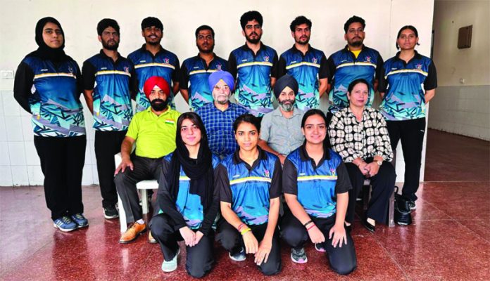 Selected Deaf Judo athletes posing with dignitaries.