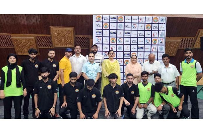 Taekwondo players posing along with dignitaries during inaugural event at Srinagar. Taekwondo players posing along with dignitaries during inaugural event at Srinagar.