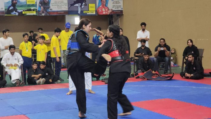 Pencak Silat athletes in action during competition.