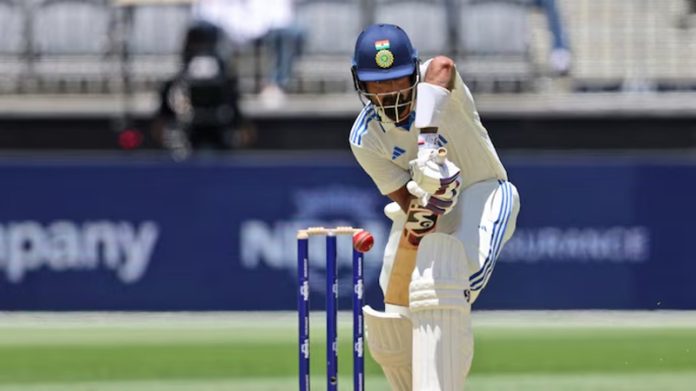K L Rahul playing a defensive shot during a match against England Lions.