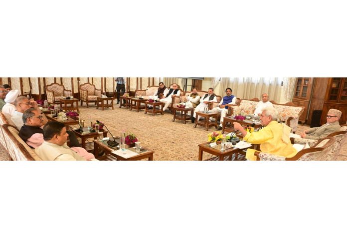 LG meeting political leaders at Srinagar on Thursday.
