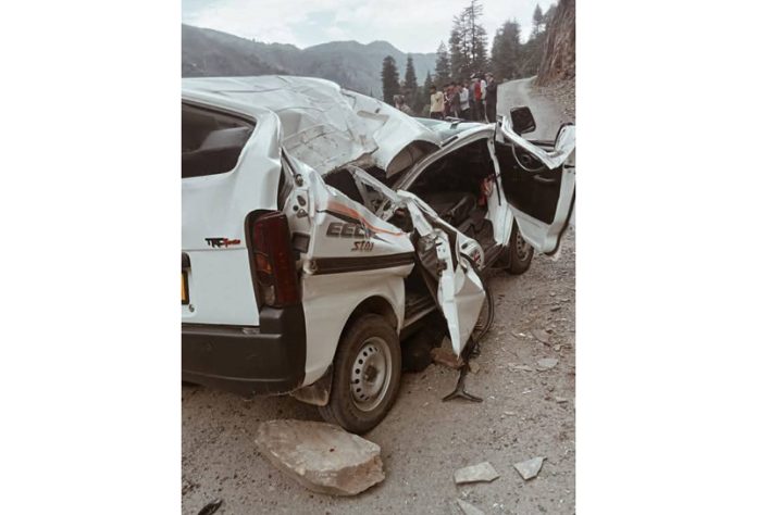 Remains of a Taxi damaged by a rolling boulder in Ramban on Sunday. -Excelsior/Parvez Remains of a Taxi damaged by a rolling boulder in Ramban on Sunday. -Excelsior/Parvez