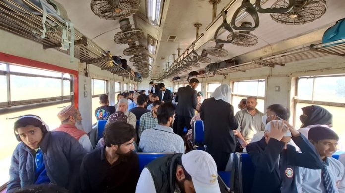 A railway official checking the tickets of the passengers under the campaign launched in Jammu. A railway official checking the tickets of the passengers under the campaign launched in Jammu.