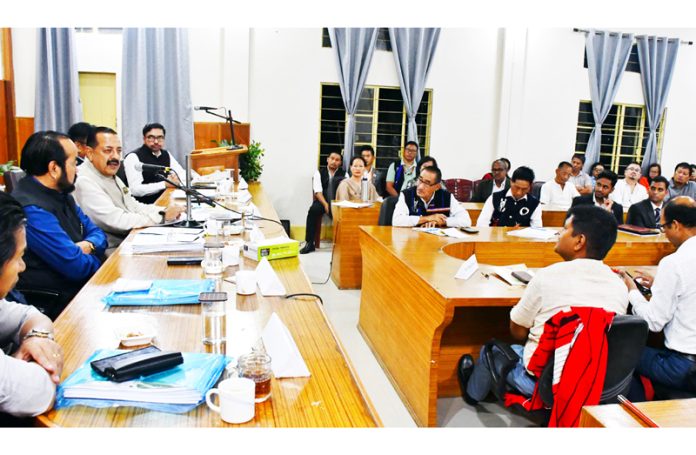 Union Minister Dr Jitendra Singh, flanked by the State Deputy Chief Minister Yanthungo Patton, chairing a meeting of administration at Wokha, Nagaland on Monday. Union Minister Dr Jitendra Singh, flanked by the State Deputy Chief Minister Yanthungo Patton, chairing a meeting of administration at Wokha, Nagaland on Monday.