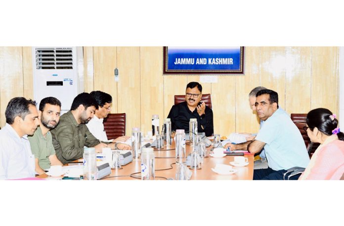 Minister Javed Ahmed Rana chairing a meeting at Srinagar on Monday. Minister Javed Ahmed Rana chairing a meeting at Srinagar on Monday.