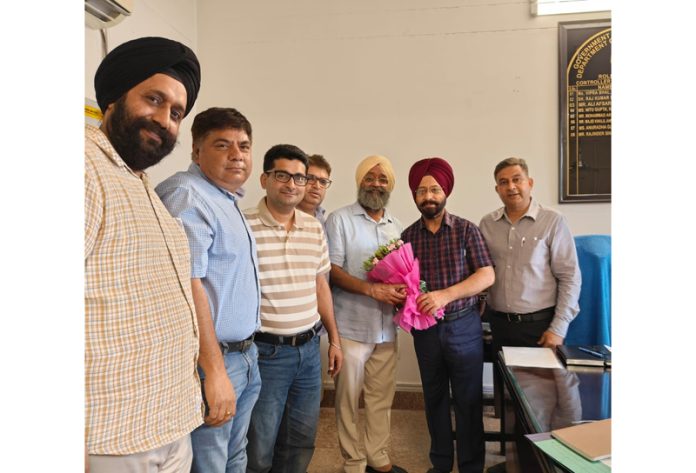 A delegation of the petroleum dealers greeting Controller Legal Metrology in Jammu on Saturday.
