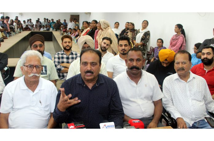 Leaders of JMWU and BMS during a conference in Jammu on Saturday. -Excelsior/Rakesh