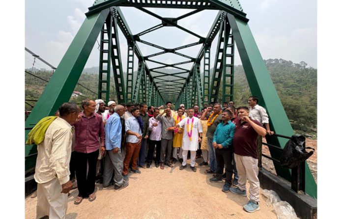 MLA Dr Sunil Bhardwaj inaugurating motorable bridge in Kulwanta area of Ramnagar on Saturday.