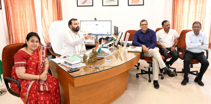 Manoj Kumar, Chairman KVIC, releasing the subsidy to the beneficiaries on Saturday.