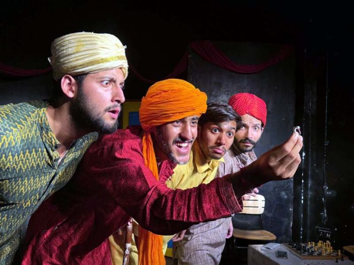 Artists performing in a play staged by Natrang in its weekly series 'Sunday Theatre'.
