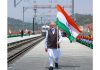 PM Narendra Modi carrying Tricolor walking on rail bridge over river Chenab in Reasi.