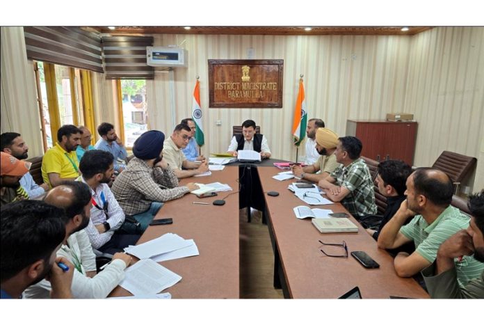 DC Baramulla chairing a meeting on Saturday.