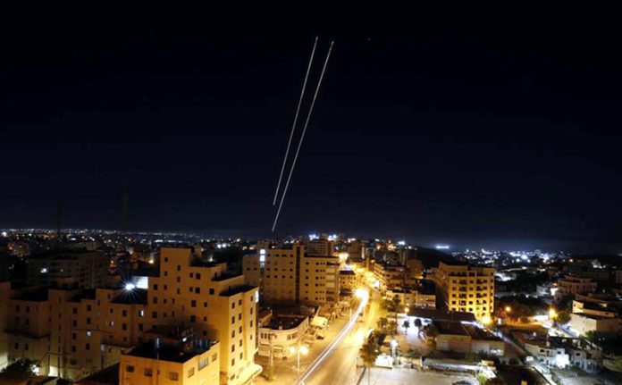 Missile traces are seen from city of Hebron in the Southern West Bank, during Iran’s missile attack against Israel on Wednesday. (UNI)