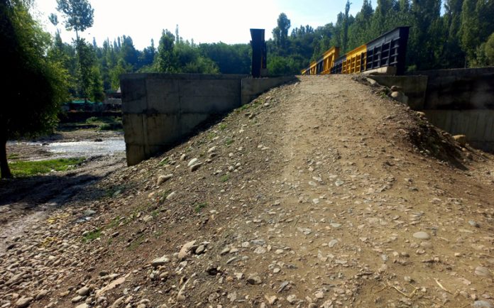 View of the complete bridge awaiting approaches at Dargam Pattan area of Baramulla district. — Excelsior/Aabid Nabi
