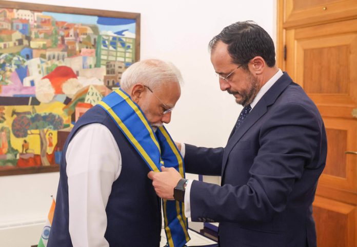 President Cyprus Nikos Christodulides confers Prime Minister Narendra Modi with the ‘Grand Cross of the Order of Makarois III’ of Cyprus, in Nicosia on Monday. (ANI)