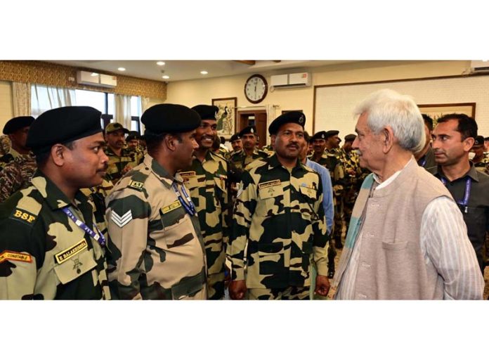 LG Manoj Sinha interacting with soldiers from Telangana and Goa at Raj Bhawan in Srinagar on Monday. LG Manoj Sinha interacting with soldiers from Telangana and Goa at Raj Bhawan in Srinagar on Monday.