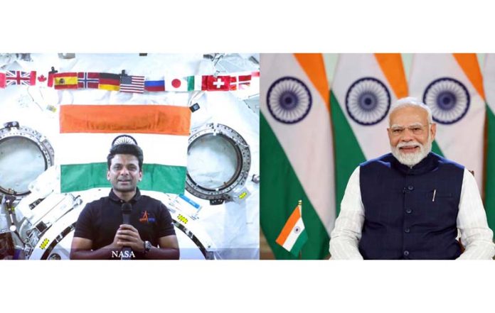 Prime Minister Narendra Modi interacts with Group Captain Shubhanshu Shukla, who is aboard the International Space Station via video conference, in New Delhi on Saturday.