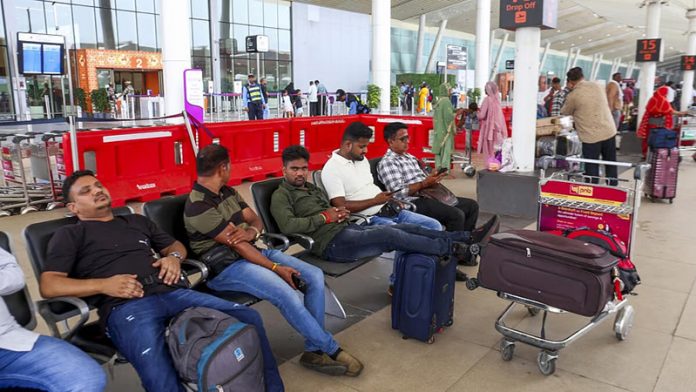 Passengers wait at Sardar Vallabhbhai Patel International Airport after Air India’s flight to London from Ahmedabad was cancelled.(PTI) Passengers wait at Sardar Vallabhbhai Patel International Airport after Air India’s flight to London from Ahmedabad was cancelled.(PTI)