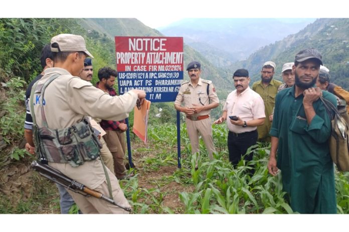 Cops attach property of a terrorist in Ramban. Cops attach property of a terrorist in Ramban.