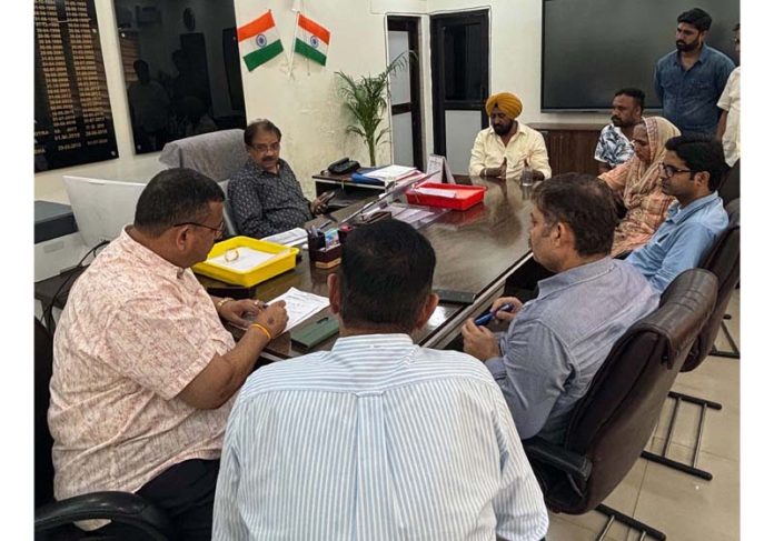 Congress leader Taranjit Singh Tony during meeting with CE PHE in Jammu.