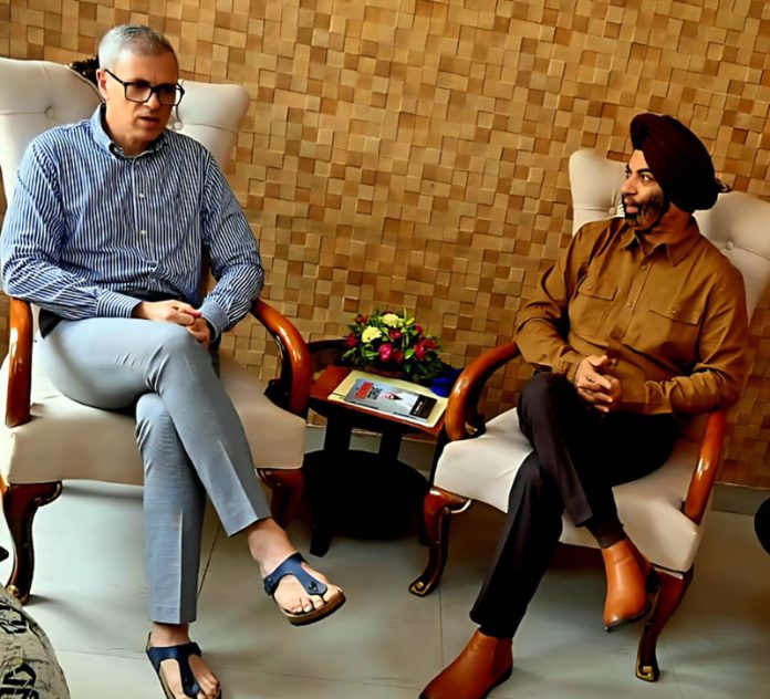 Dr. Suminder Singh, MD Operations IDPS during a meeting with CM Omar Abdullah.